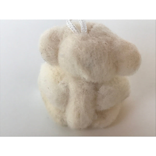 Tiny plush teddy bear